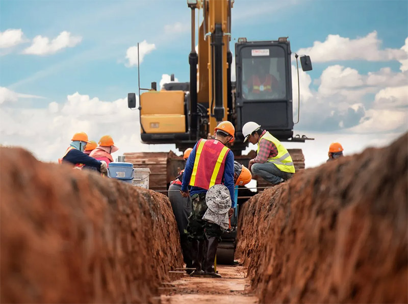 digging an underground utility trench in Northwest Arkansas