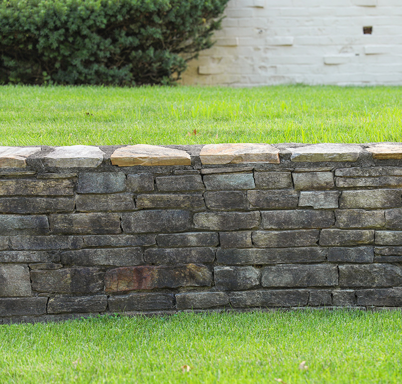 Photo of a stone retaining wall in Centerton, Arkansas.